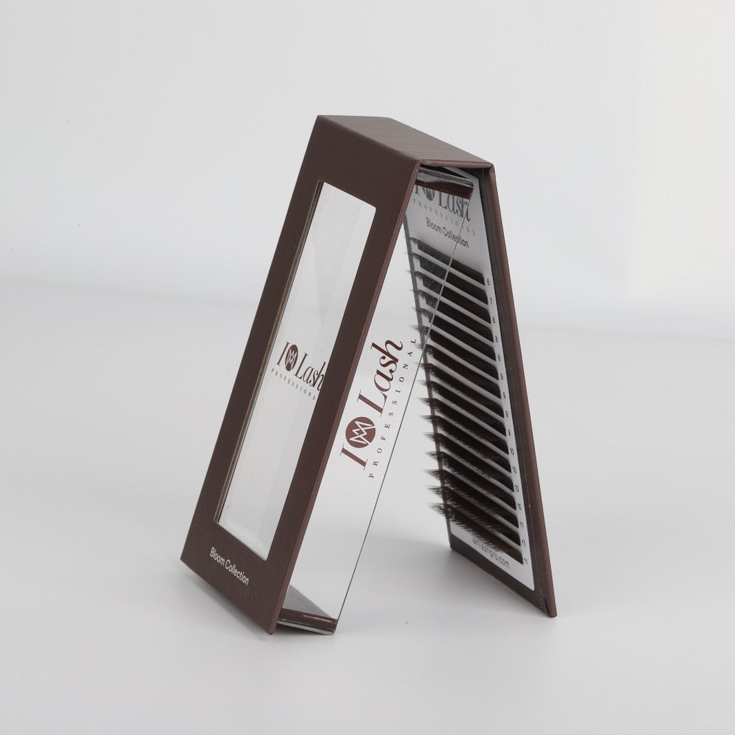 Brown 4DW pre-made volume eyelash extension fans by I AM Lash, showcasing full, natural-looking lash extensions on a white background.